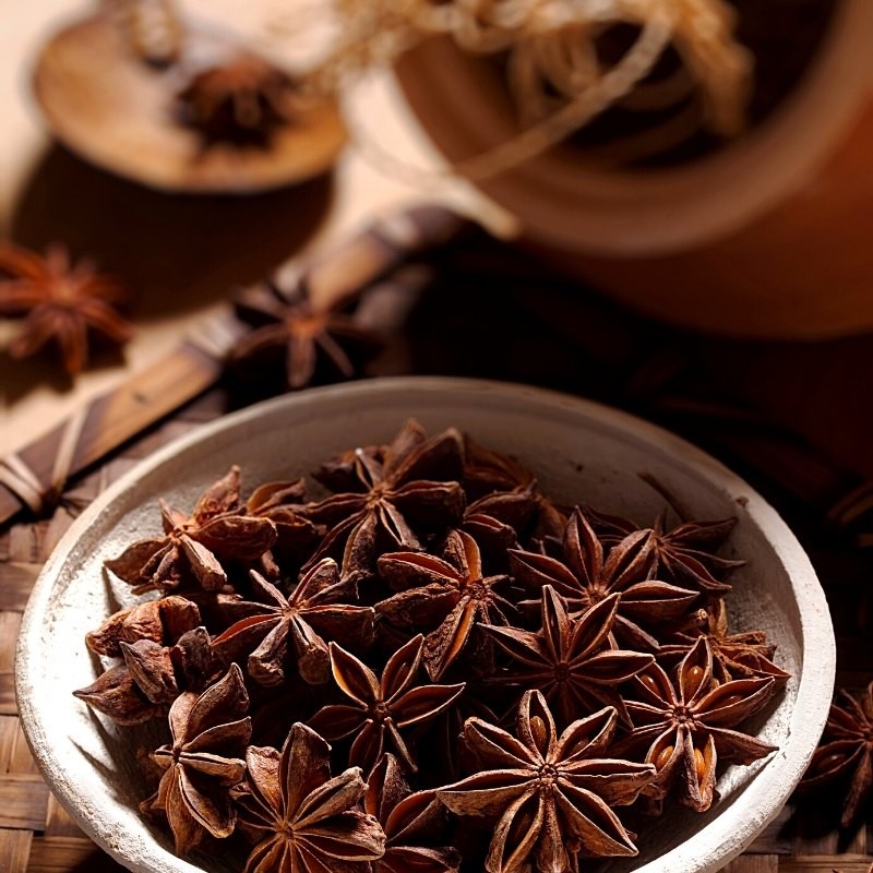dried star anise in a bowl dried star anise in a bowl
