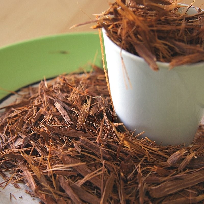 yellow uxi bark in a bowl and on a plate