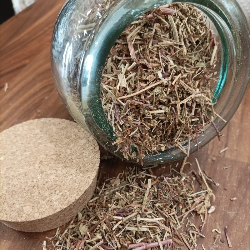dried sorrel in a glass jar on a table